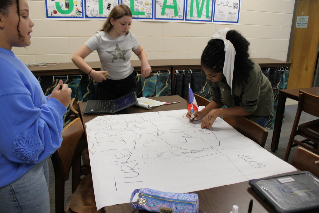 kids working on map project