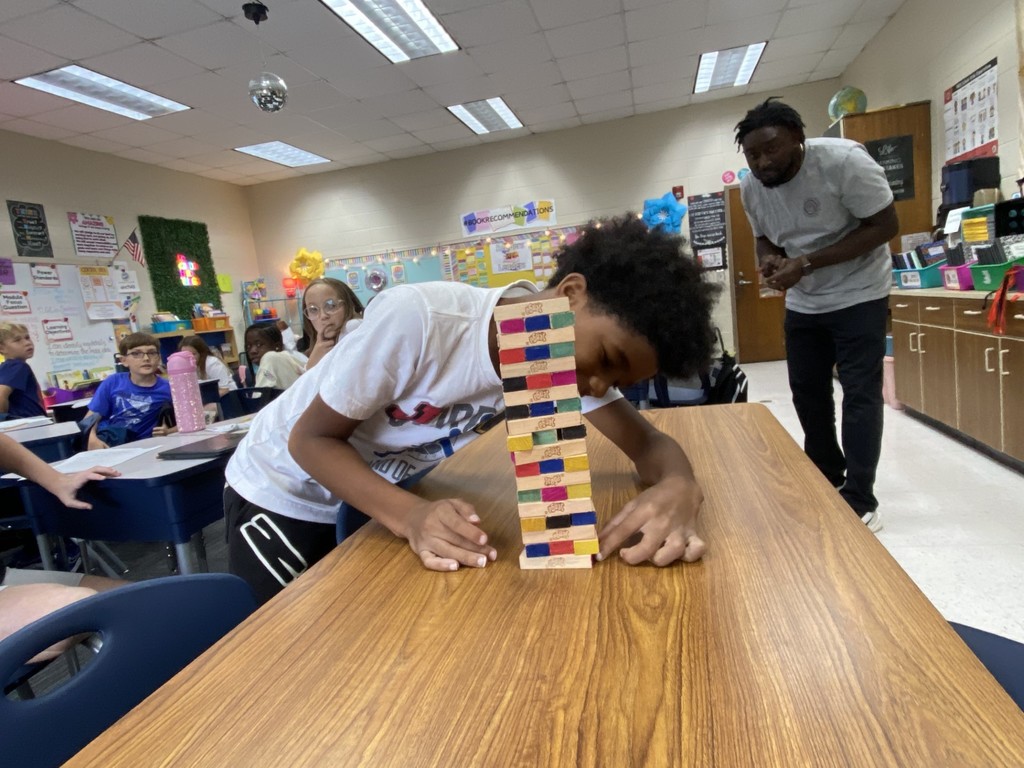 students playing Jenga