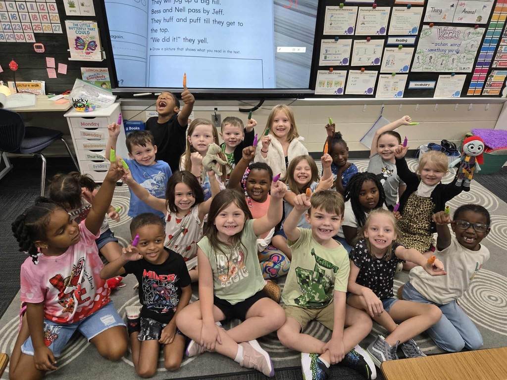 first grade students practice tracking