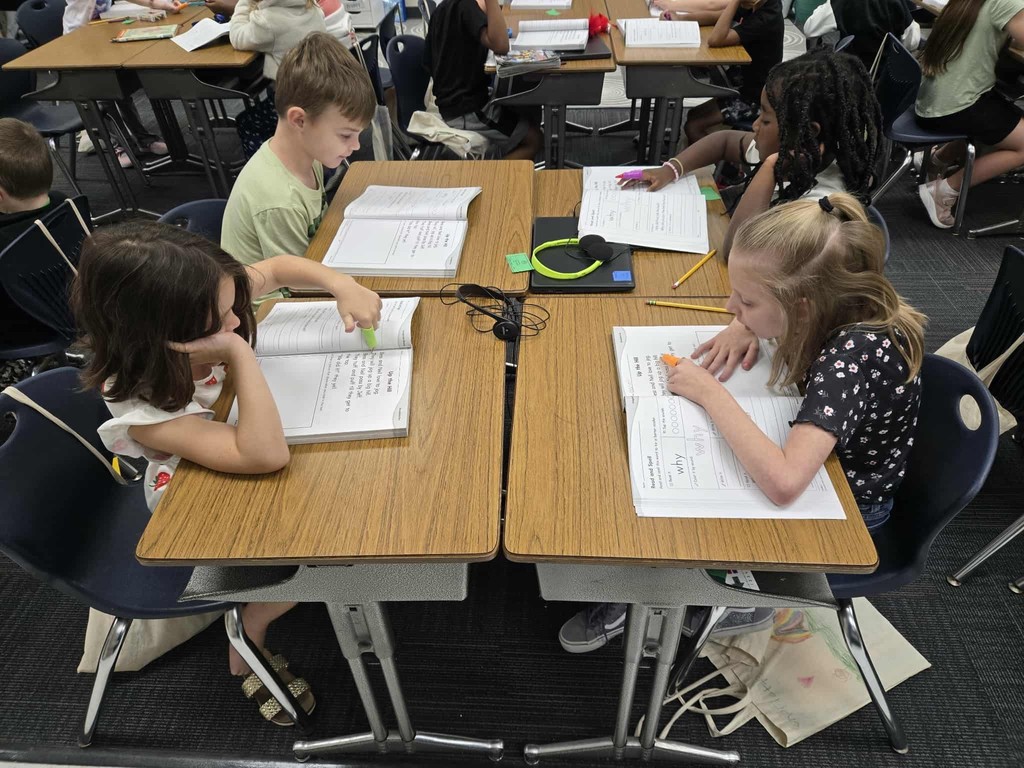 first grade students practice tracking