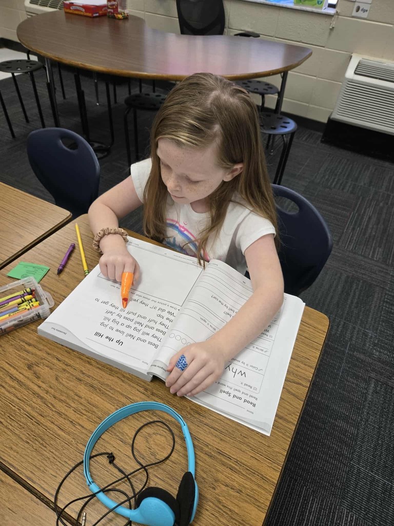 first grade students practice tracking