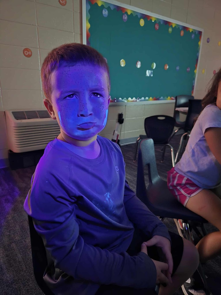 Black light flashlight showing “germs"