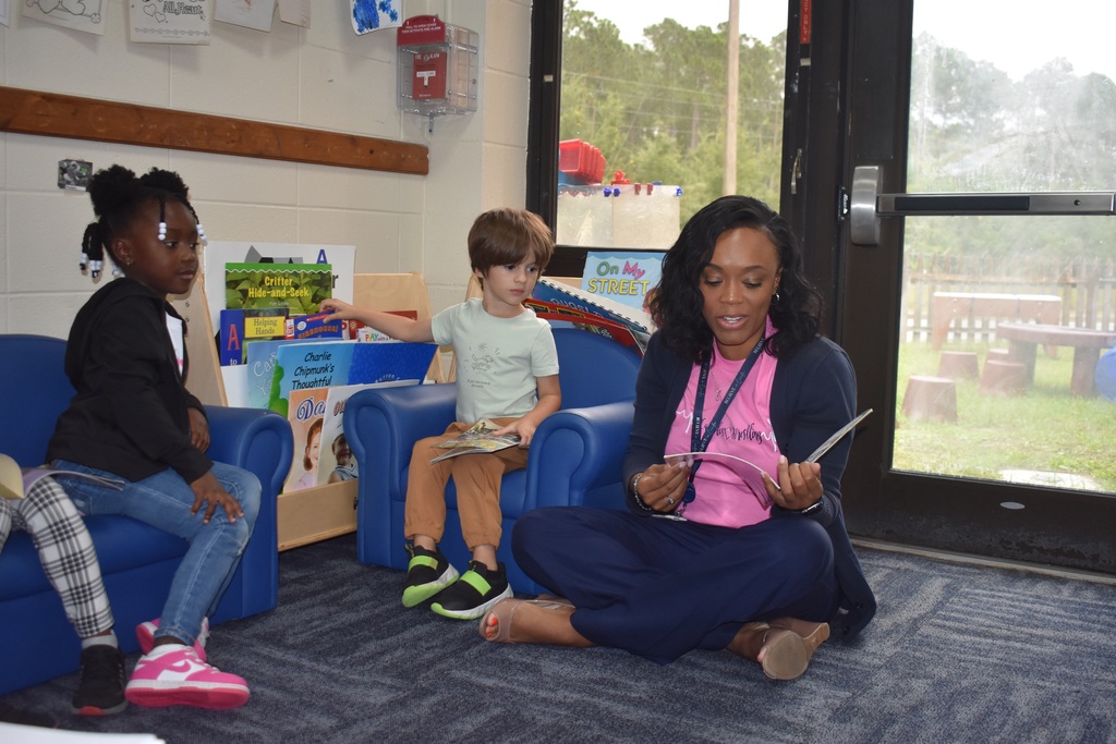 Dr. Green reading to students