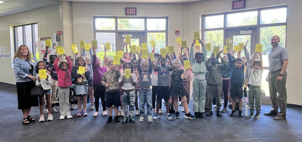third grade students get dictionaries