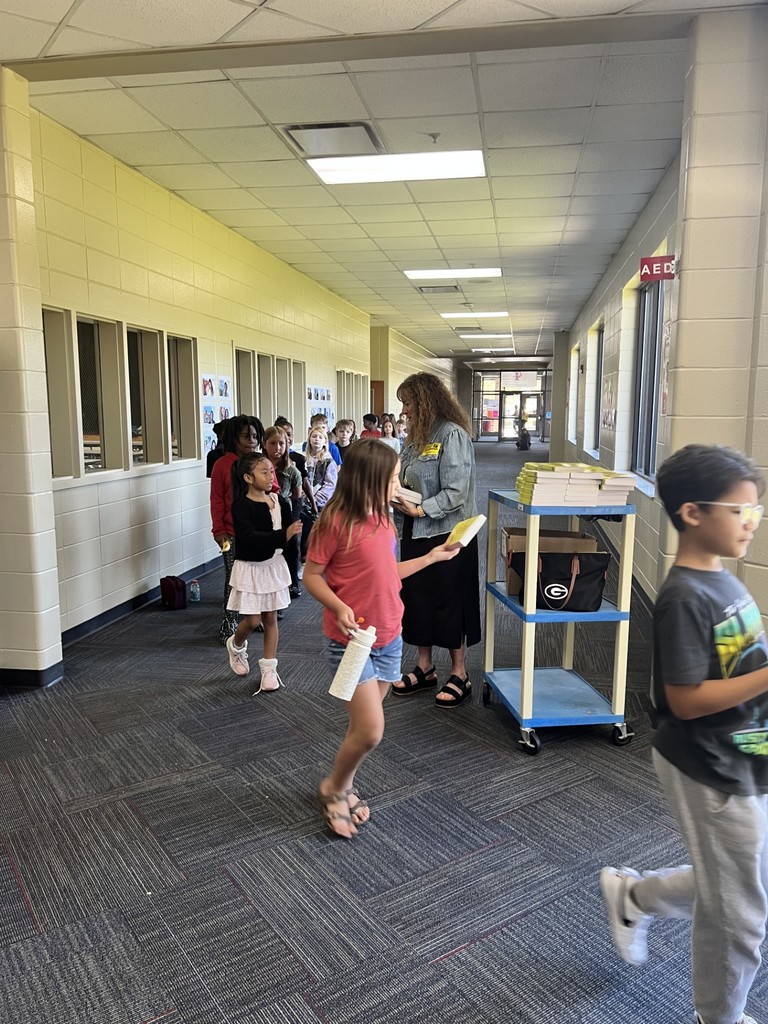 third grade students get dictionaries