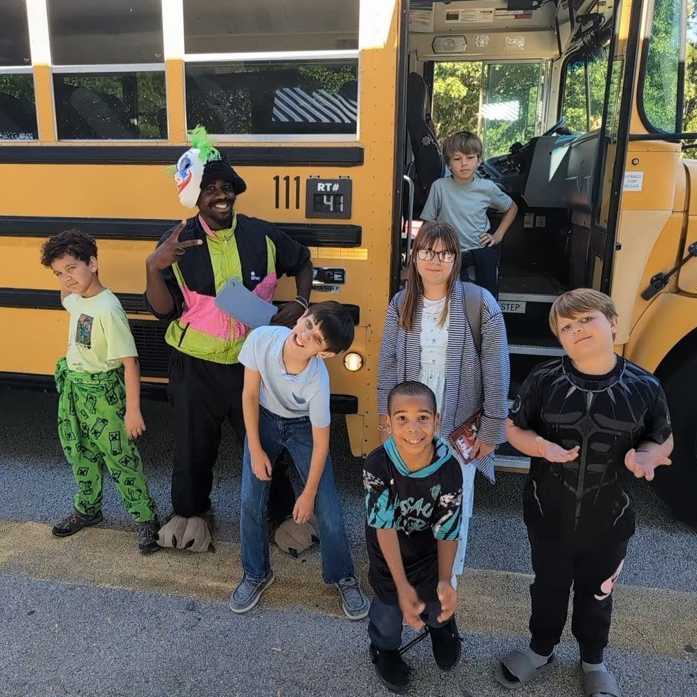 KES Bus Driver and Students