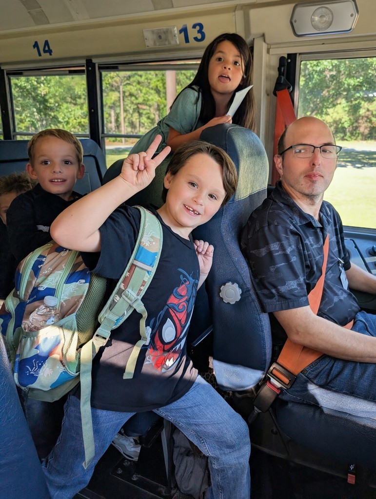 KES Bus Driver and Students