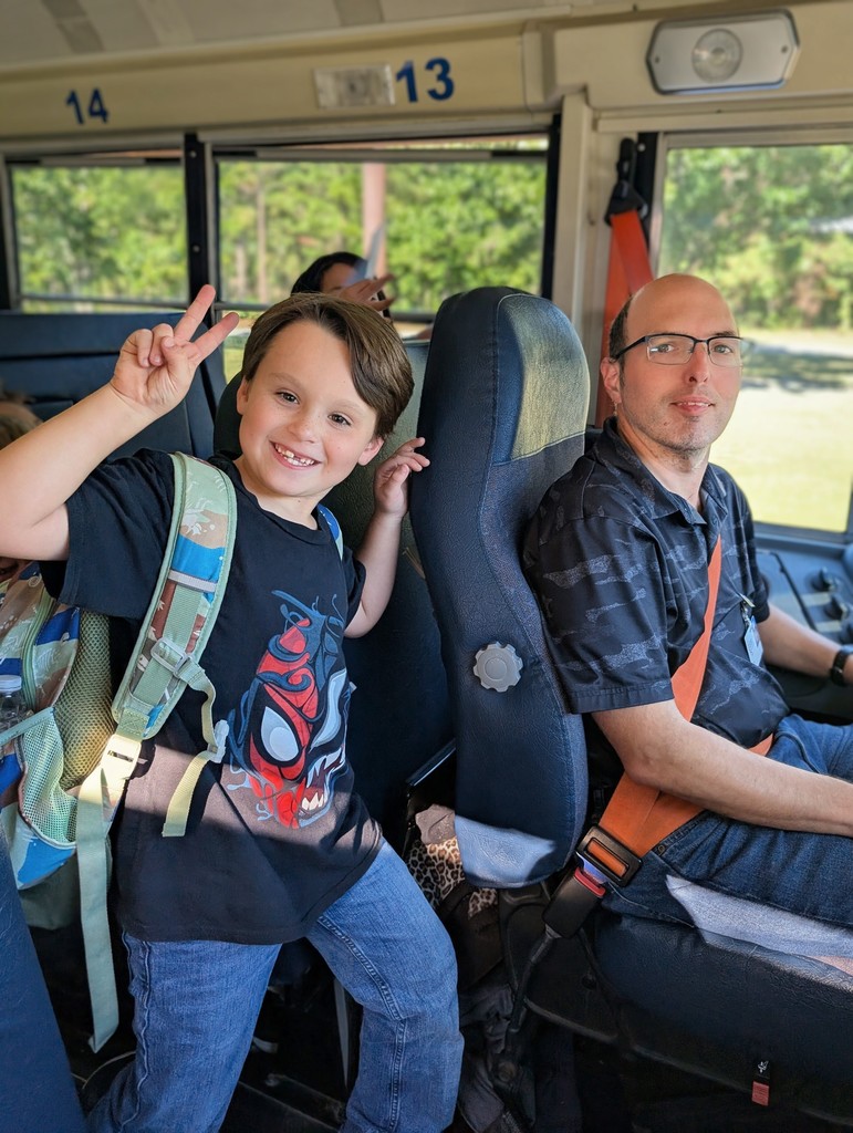 KES Bus Driver and Students