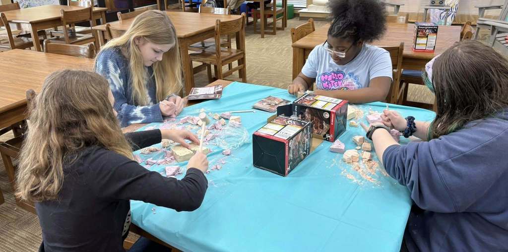 students digging through the rock