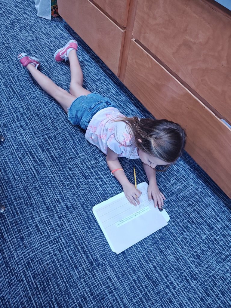 girl working on her reflection.