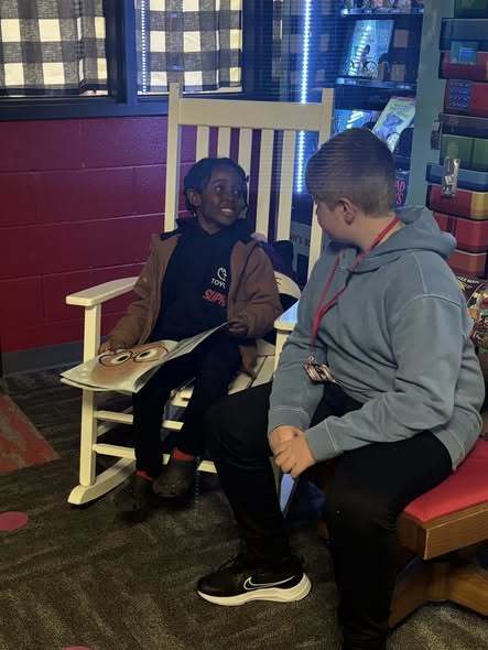 5th graders reading to kindergarteners