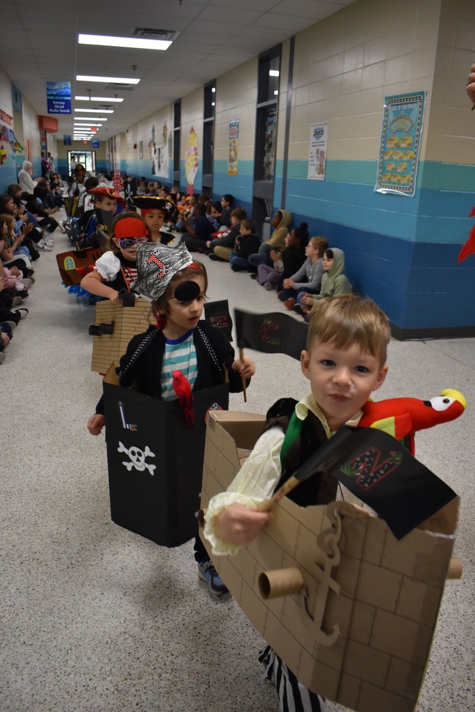students walking in parade as pirates