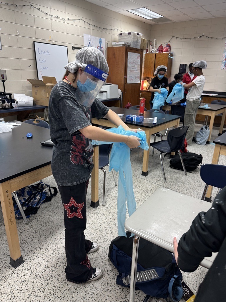 student from class putting no required protection and sanitary items