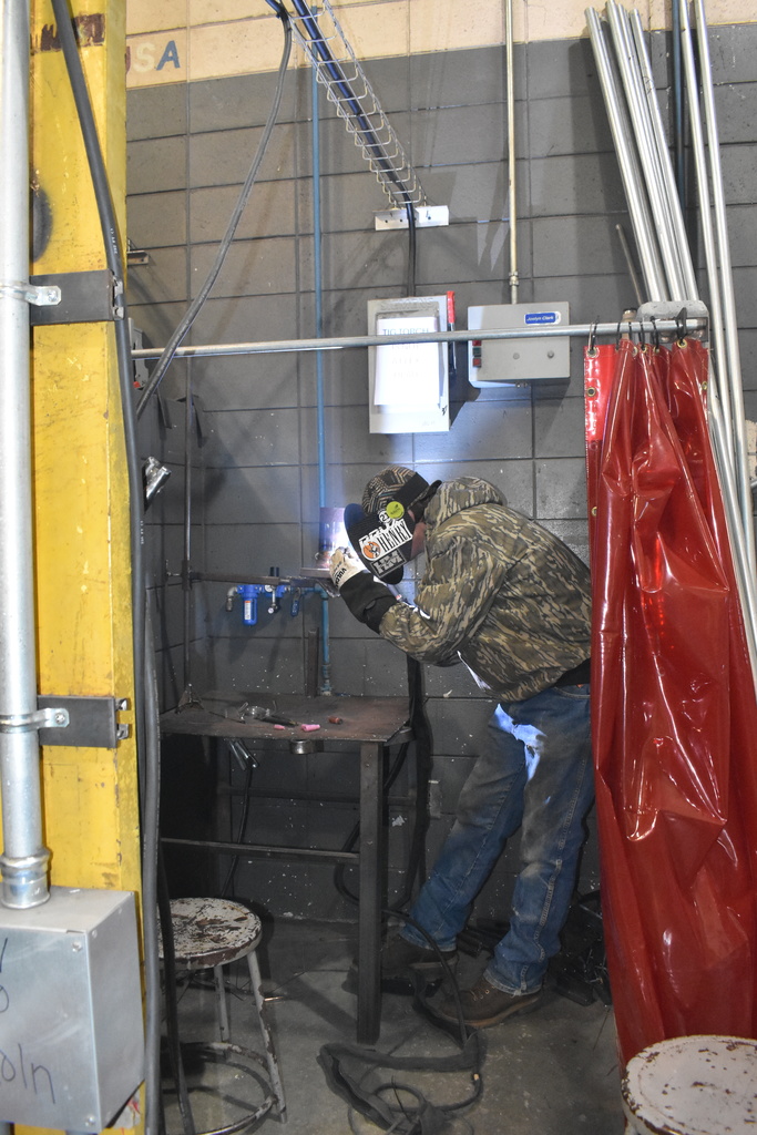student welding