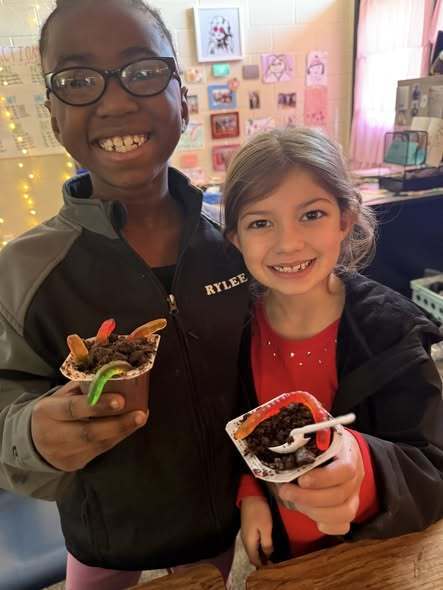 students holding treat