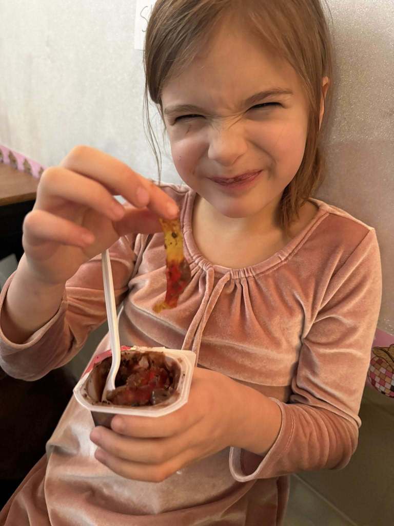 student eating gummy worn