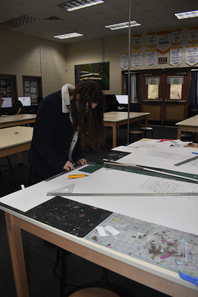 students doing drafting on paper