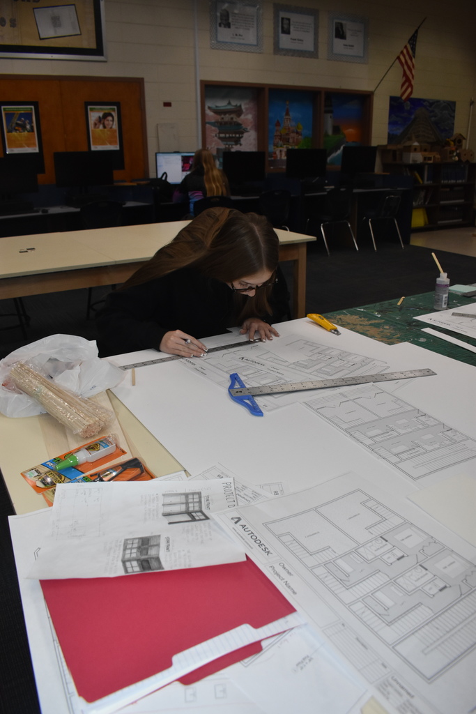 students doing drafting on paper