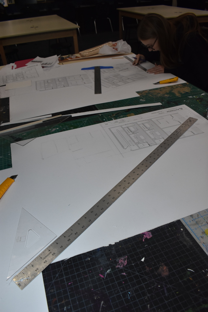 students doing drafting on paper