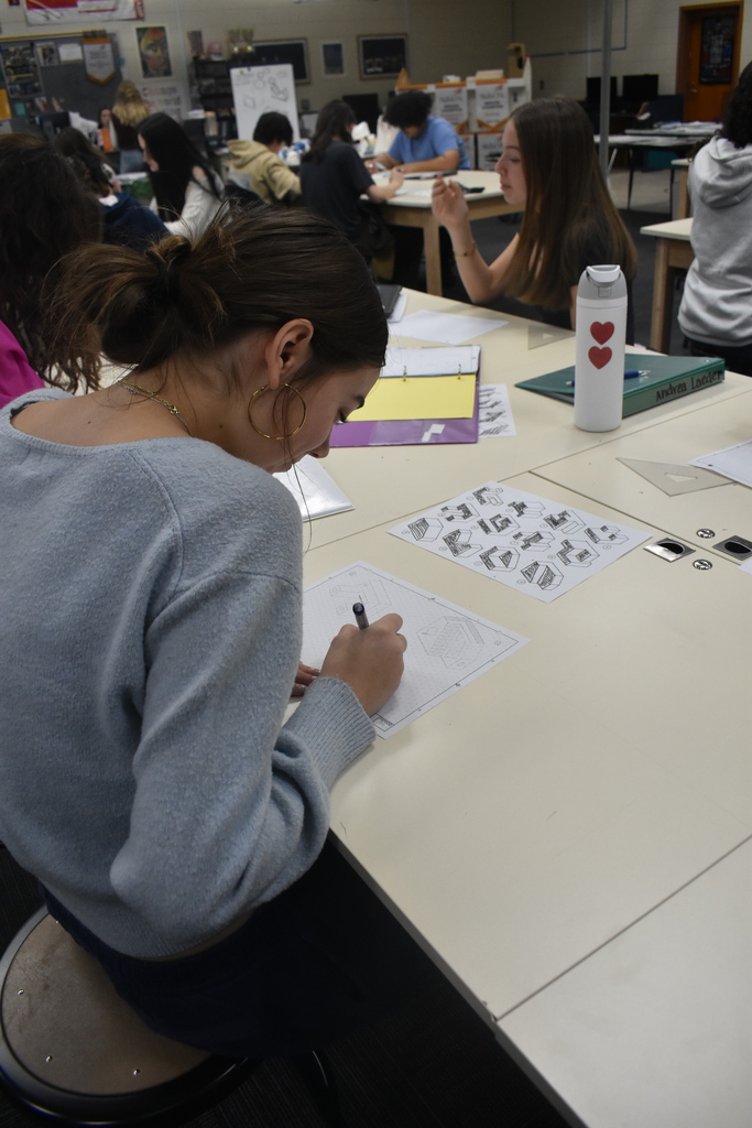 students doing drafting on paper