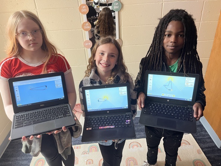 students working on assignment on chromebooks