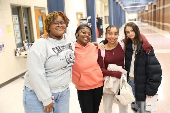 students outside of school store