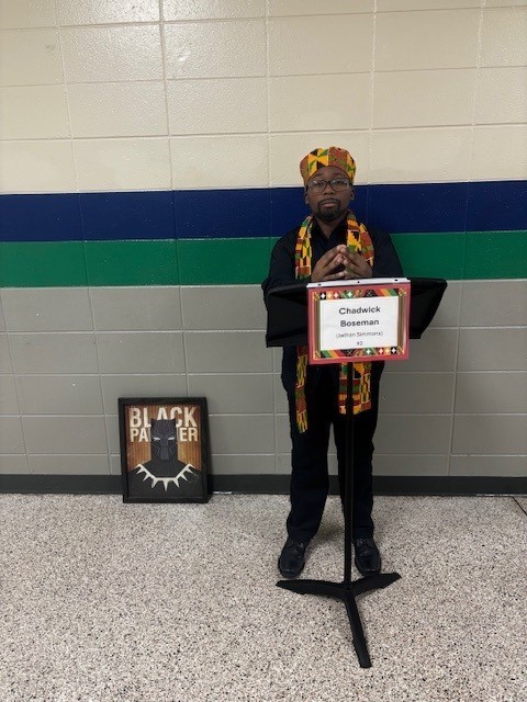 student dressed up as Chadwick Boseman