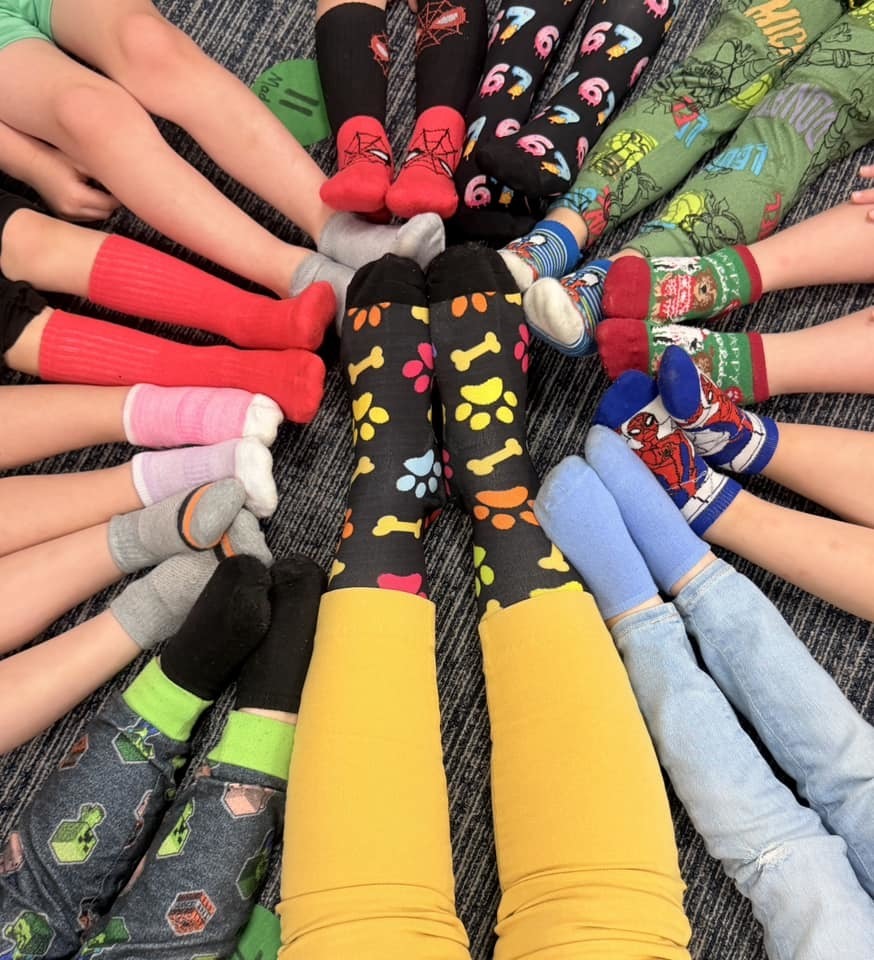 students crazy socks on crazy sock day