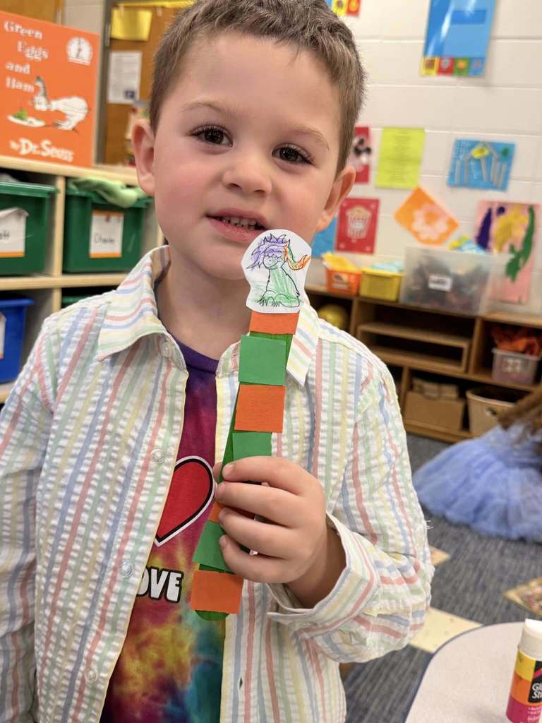 student holding project