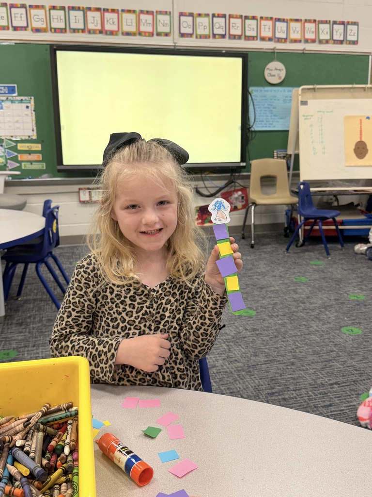 student holding project