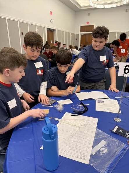 students at work doing their competition