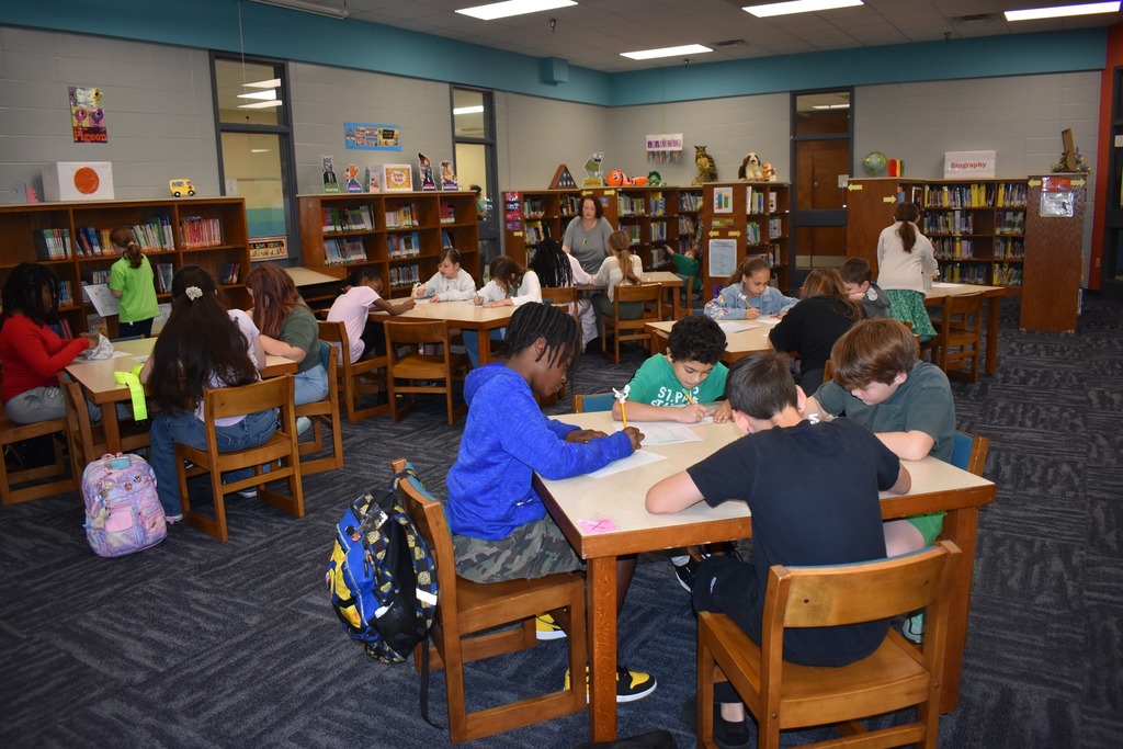 student working on handwriting
