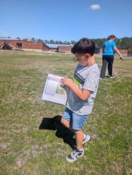 students walking and reading