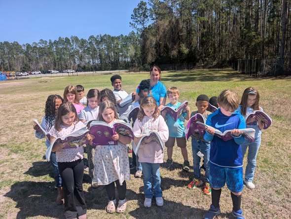 students walking and reading