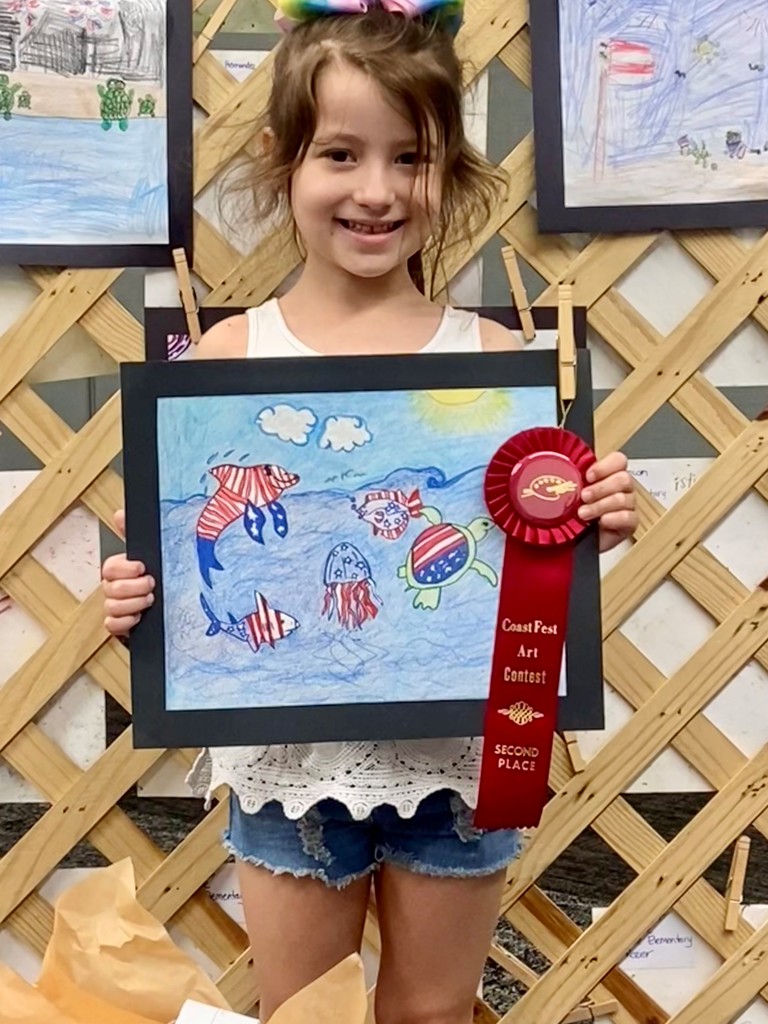 Emilia and her winning artwork