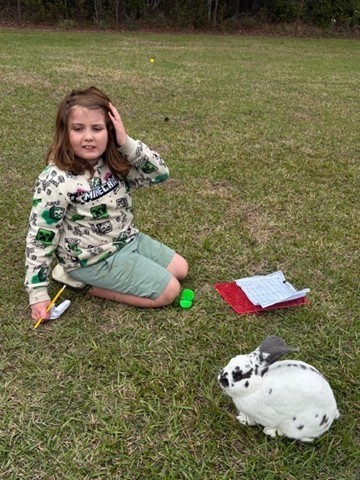 5th graders completed an egg hunt outdoors