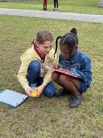 5th graders completed an egg hunt outdoors