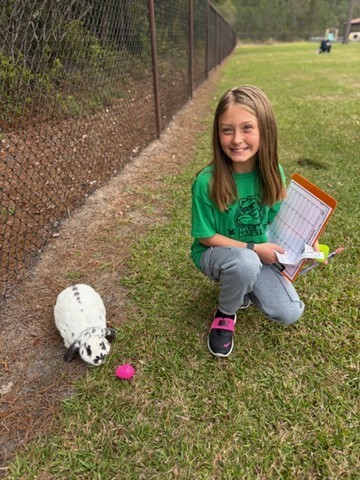 5th graders completed an egg hunt outdoors