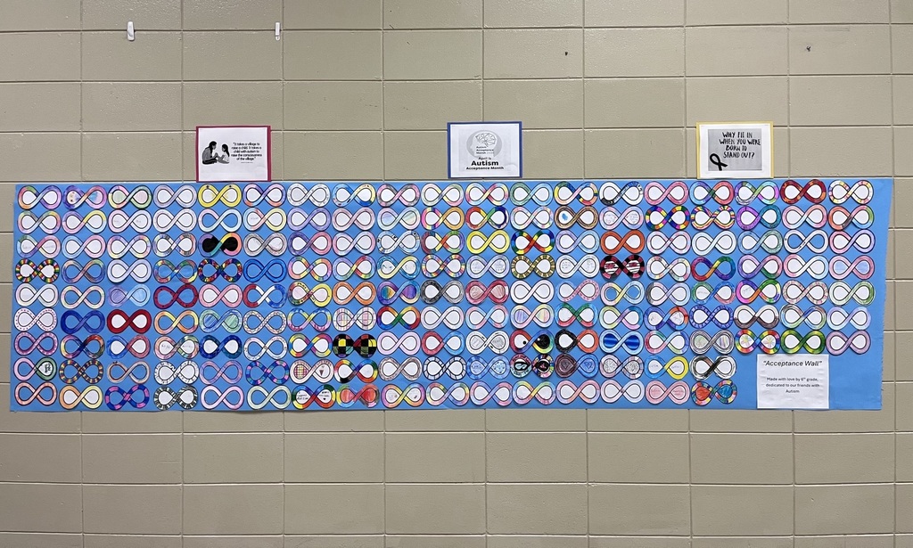 6th grade math students decorated infinity symbols to create an Acceptance Wall for Autism Awareness Month.