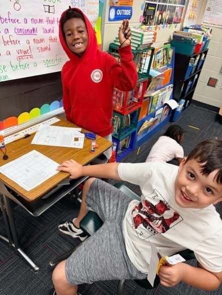 Students smiling at camera
