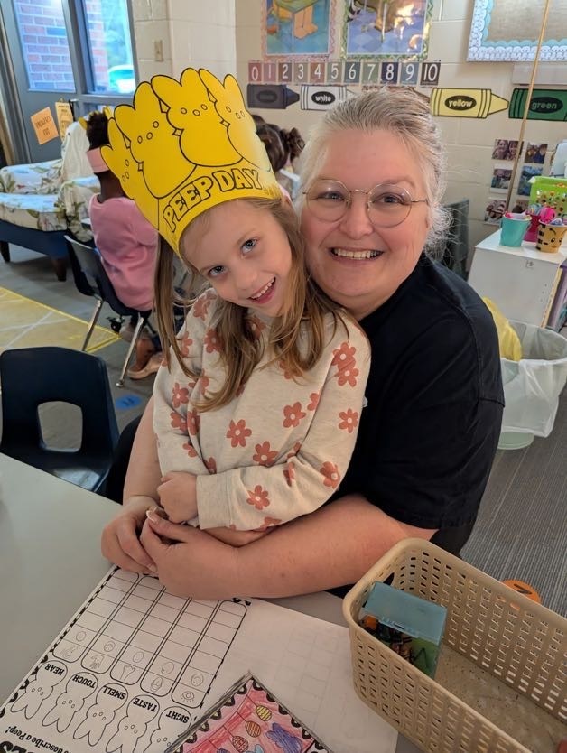 student with teacher