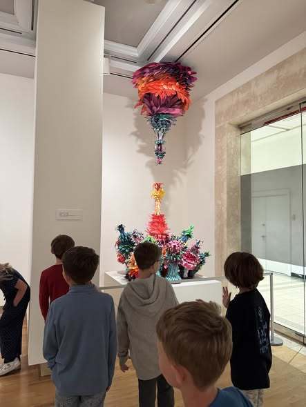 students looking at artwork