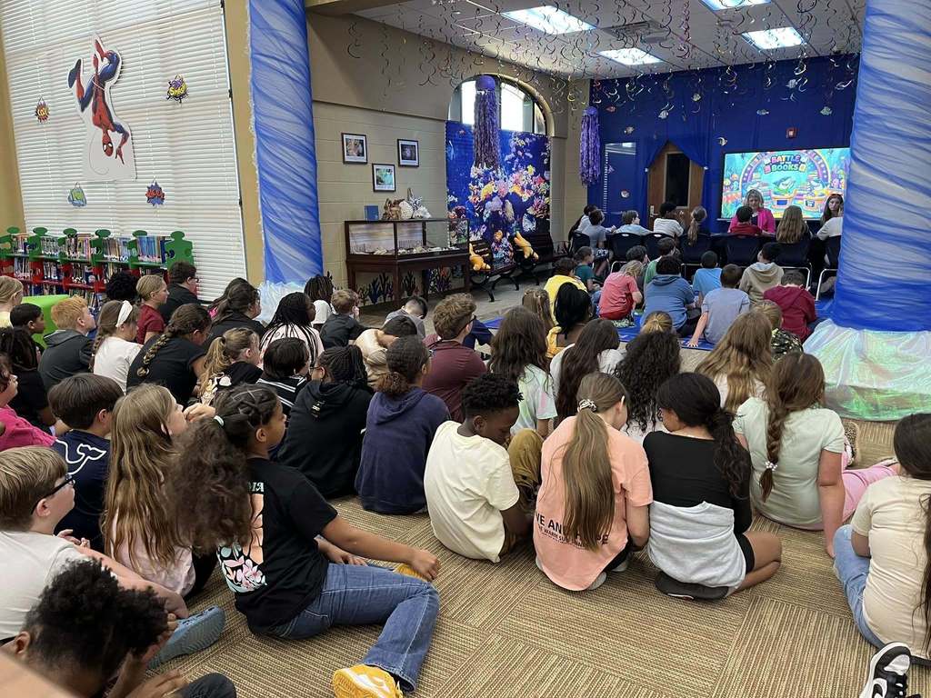 students watching other students as they battle