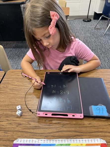 student solving math problems