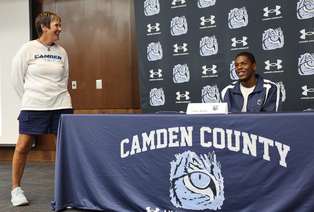 Carlos barber- swim signing photos