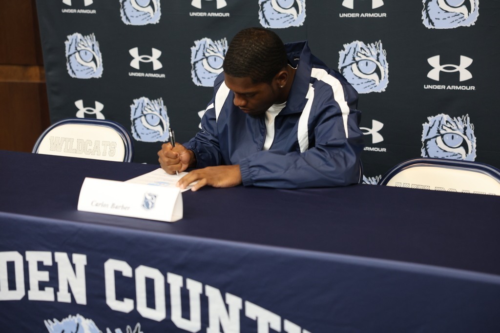 carlos barber signing