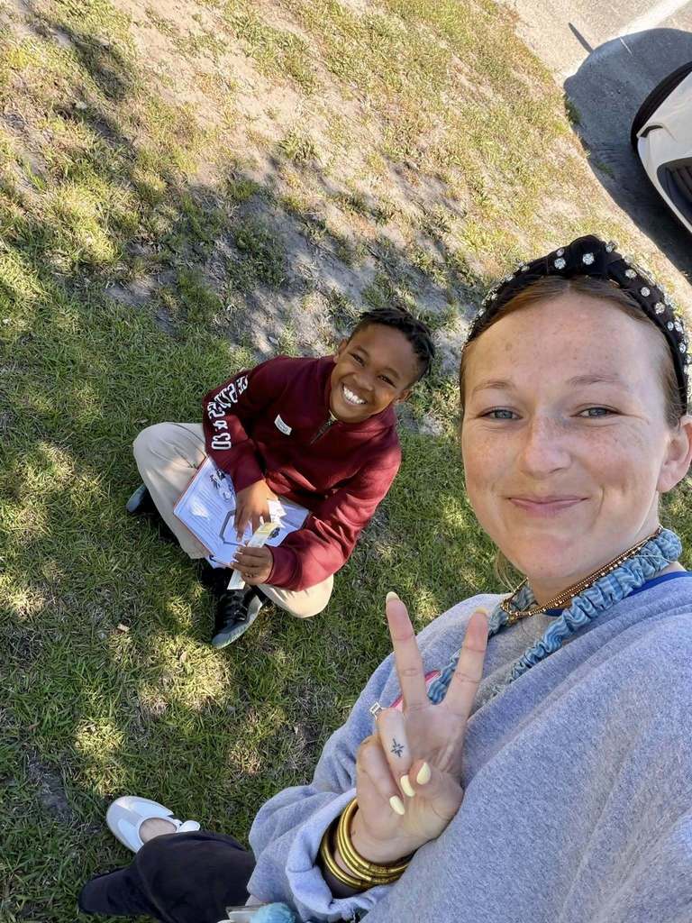 students reading outside