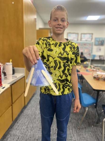 student showing their finished project