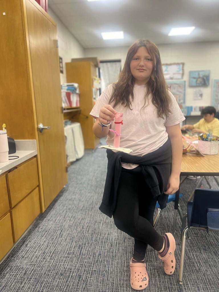 student showing their finished project