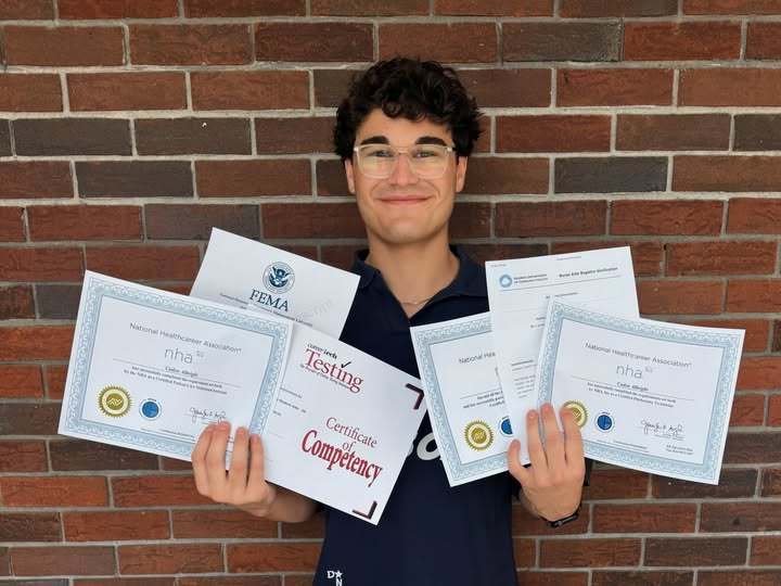 Caden Albright holding all six certifications
